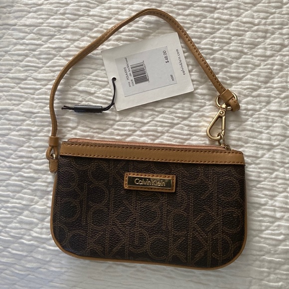 Calvin Klein Accessories - Calvin Klein Wristlet. New with Tag.